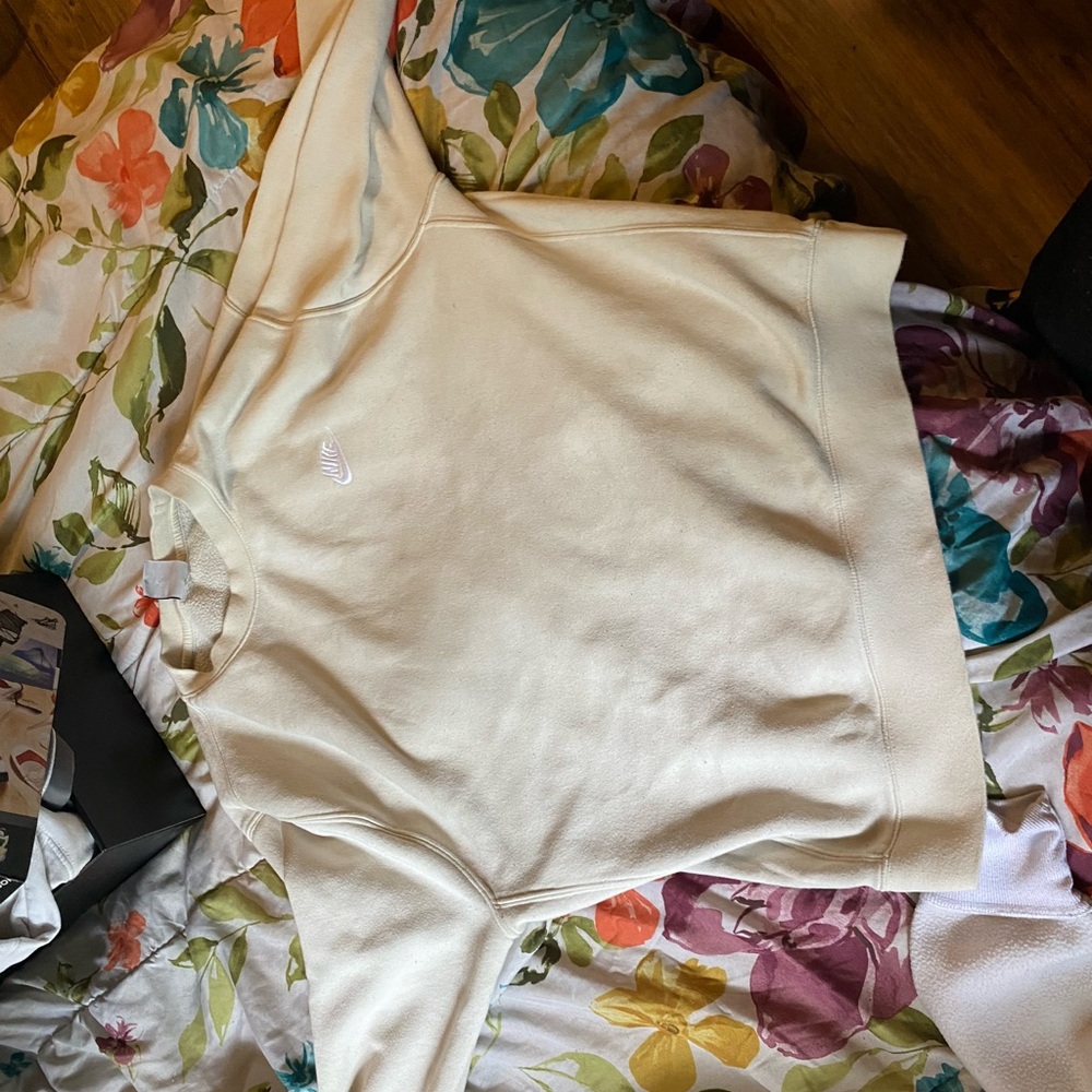 Cream Nike sweater very comfortable and only wore two short accusations